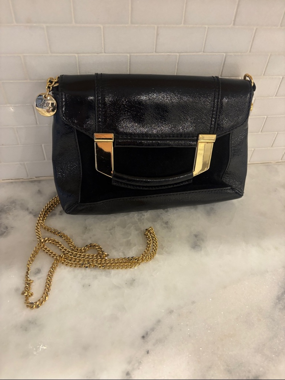 MILLY Black Patent Leather Crossbody Bag with Gold Chain